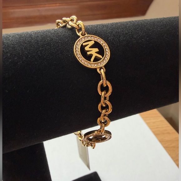 Michael Kors Jewelry - Michael Kors Gold-Tone Chain Bracelet with Logo Charms